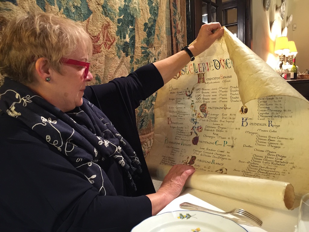 Paola studies the wine list